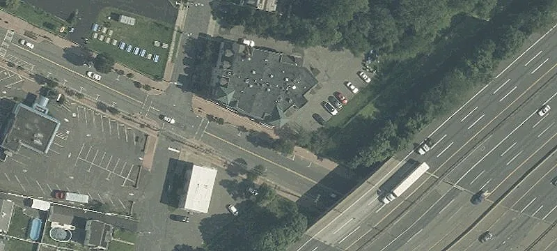 Ground-Level Service Suite Building