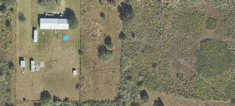 Partially Cleared, Fenced Land Lot