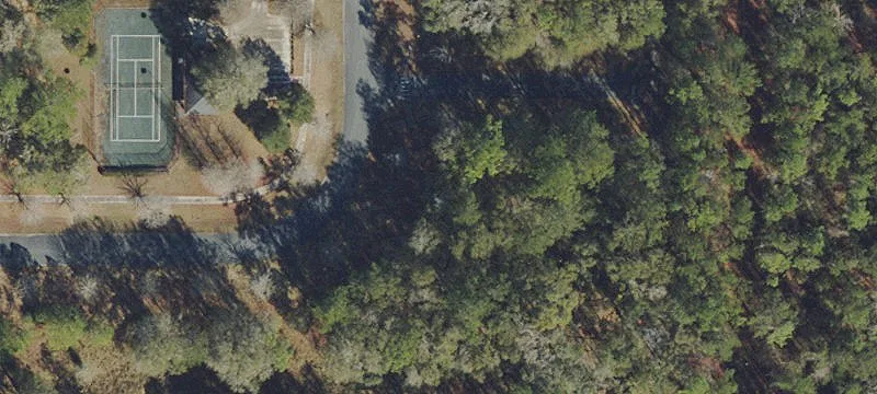 Gated Wooded Home Lot Community