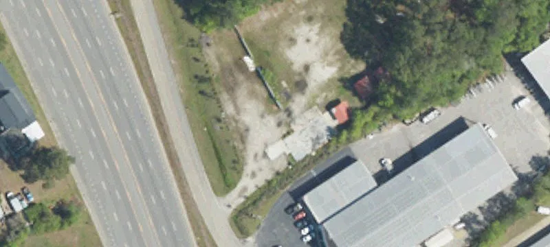 Fenced Commercial Lot with Utilities