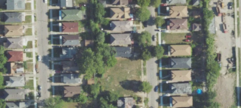 Brick Triplex with Two Lots