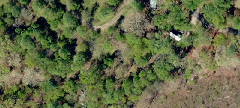 Unrestricted Land with Existing Home