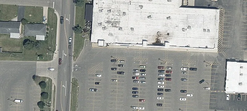Leased Shopping Center with Buildable Pad