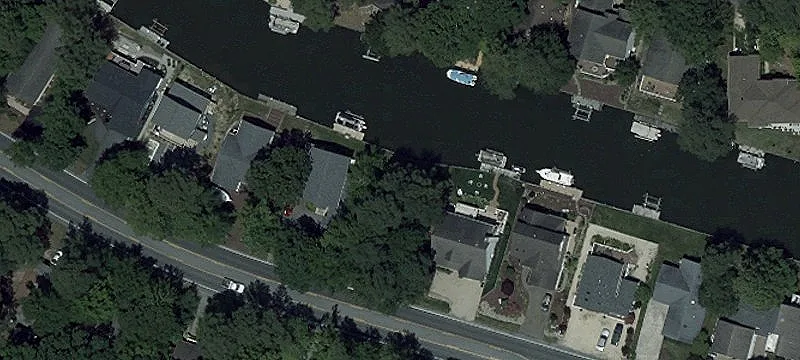 Wooded Waterfront Land Lot