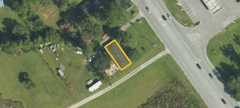 Four-Parcel Commercial Land with Buildings