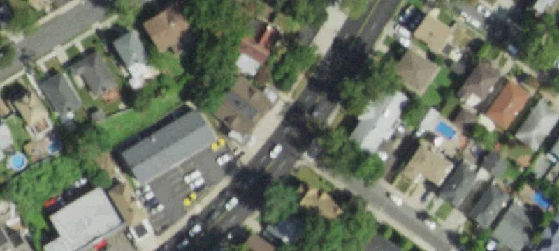 Brick Tudor Multifamily Building