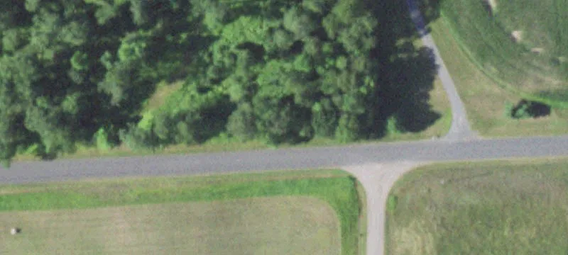 Heavily Wooded Land with Pond