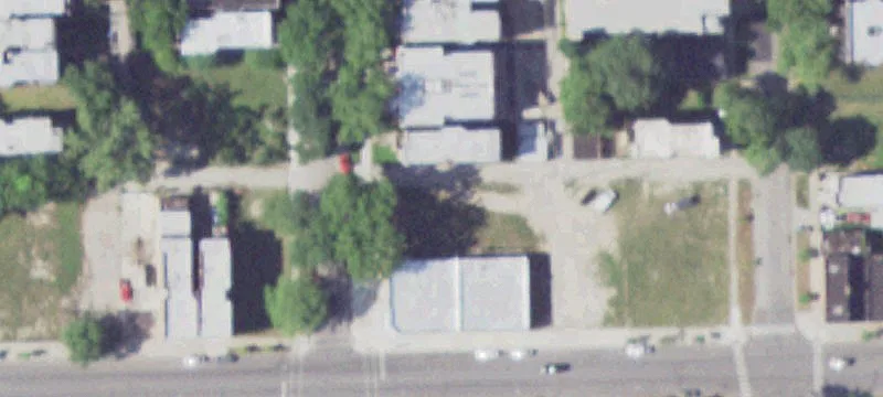 Vacant Lot Behind Commercial Building