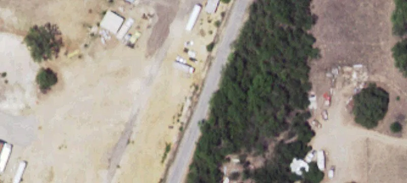 Fully Fenced Acreage with Dry Creek