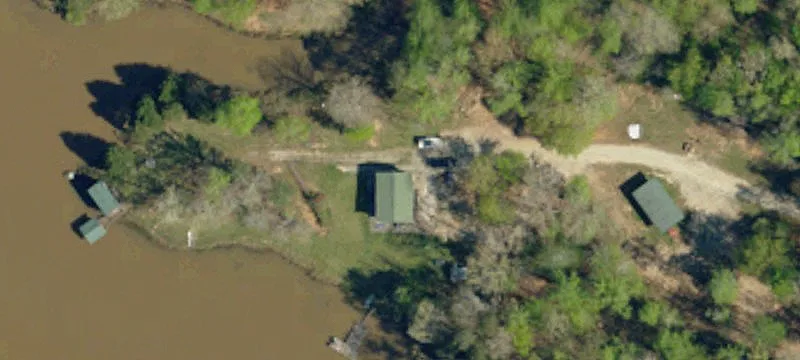 Improved Waterfront Acreage Estate