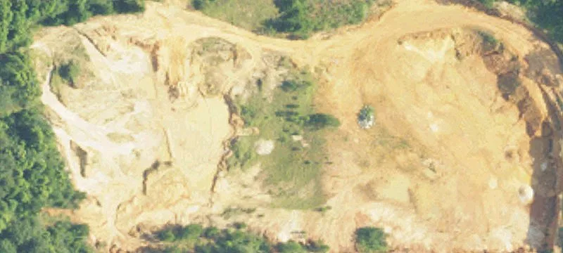 Partially Cleared Unzoned Land Parcel