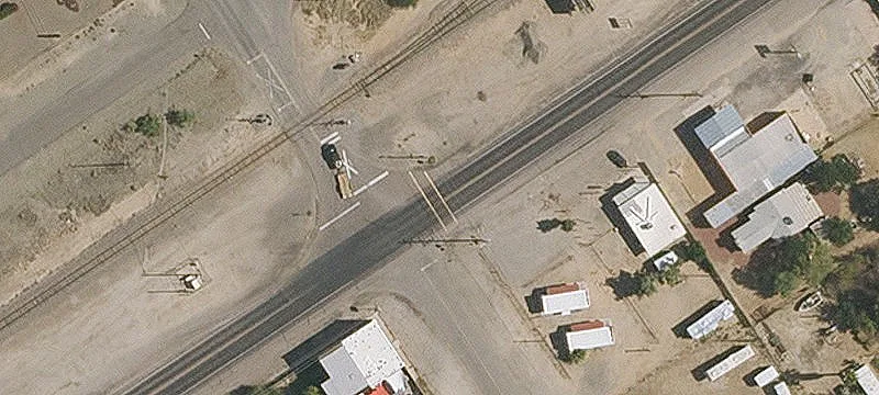 Strip Shopping Center with On-Site Home