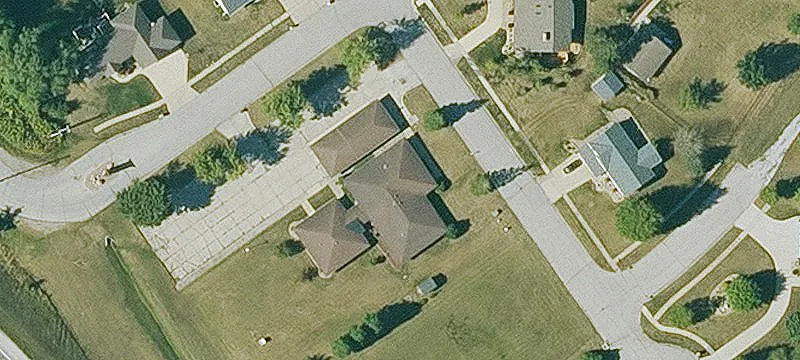 Well-Kept Triplex with Detached Garages