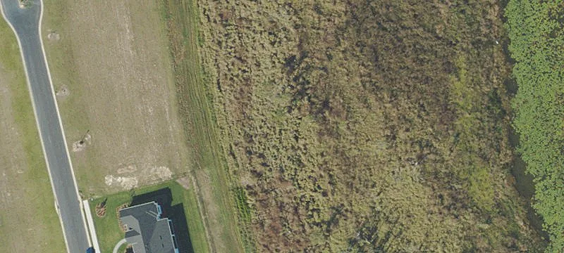 Waterfront Vacant Homesite in Gated Community