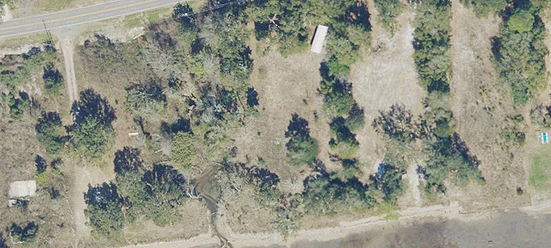 Waterfront Land with Dock Pilings