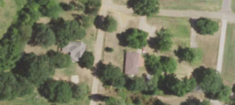 Unrestricted Land with Two Homes