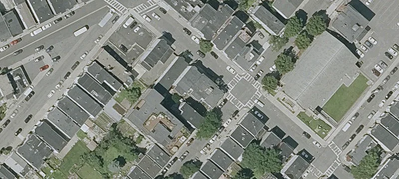 Gut-Renovated Three-Family Home