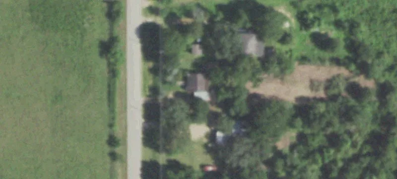 Fenced Partially Cleared Commercial Lot