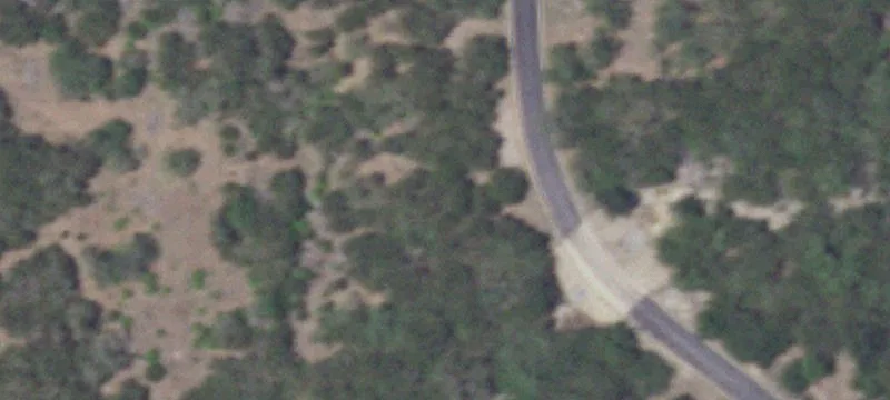 Wooded Waterfront Lot with Slope