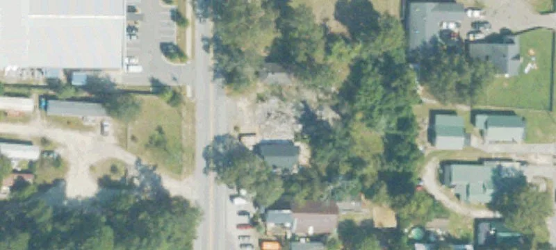 Burned Retail Building with Land