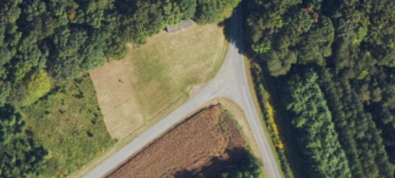 Buildable Acreage with Paved Road