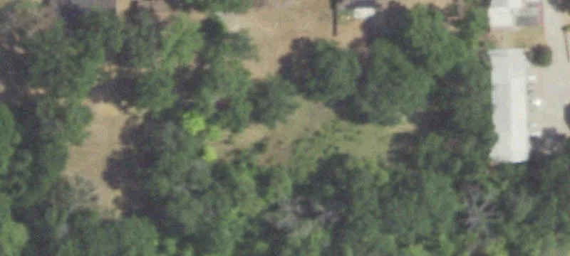 Zoned Mixed-Use Land with Vacant Home
