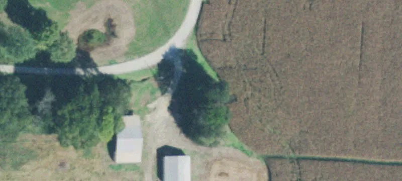 Working Farmland with Airplane Hangar