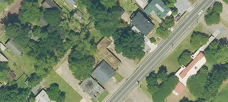Exxon-Branded Gas Station and Strip