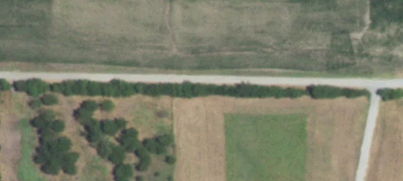 Fenced Farmland with Pond