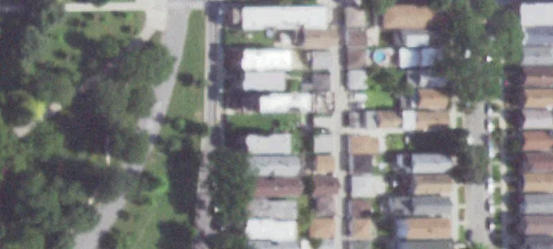 Vacant City Lot with Parking Slab