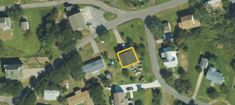 Vacant Residential Lot with Wooded Terrain