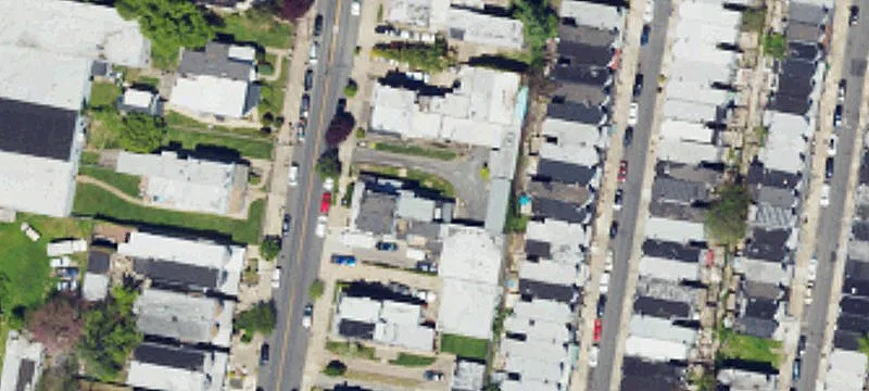 Three-Story Twin Duplex With Garage