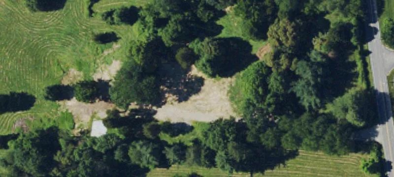 Rolling Land with Brick Home