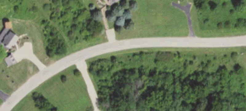 Sloped Homesite with Treed Backdrop