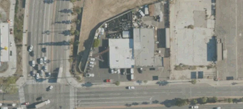 Freestanding Retail Building with Billboard