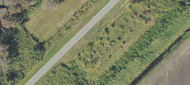 Triangle-Shaped Ranch with Railroad Frontage