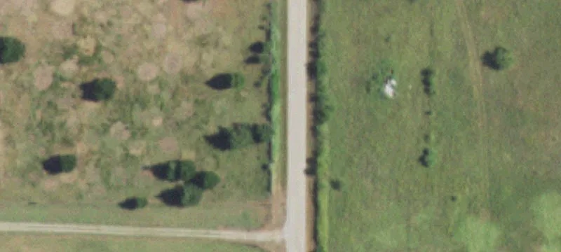 Flat Farmland Tract with Stock Tanks