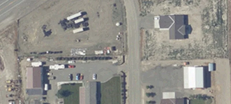 Fenced Gravel Commercial Lot