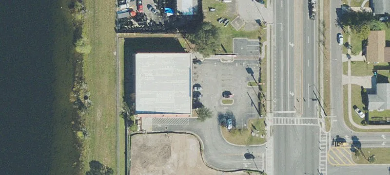 Fenced Commercial Land Lot