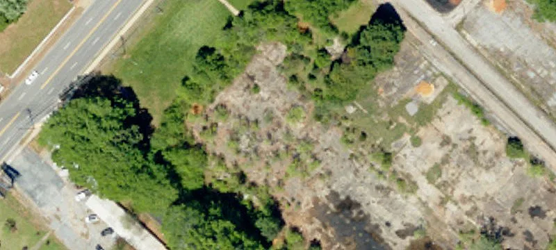 Vacant Mill Property with Chimney
