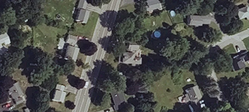 Wooded Residential Lot with Driveway Cut