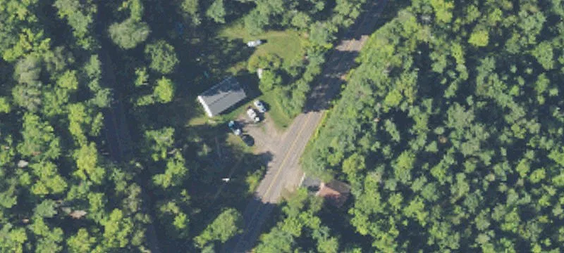 Automotive Garage and Vacant Land