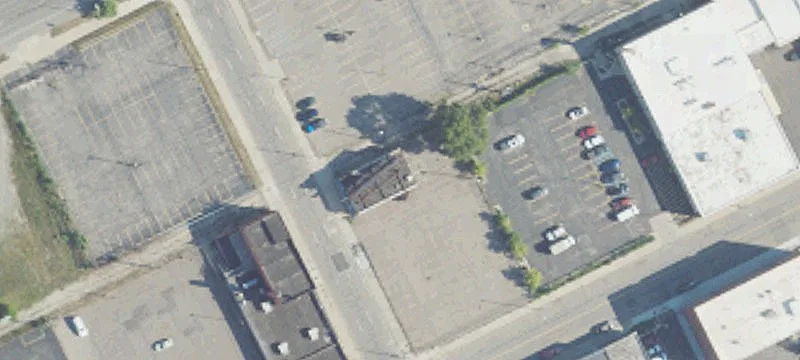 Frontage Parking Lot With Former Store