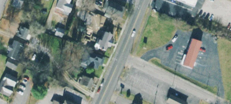 Fenced Development Site with Building