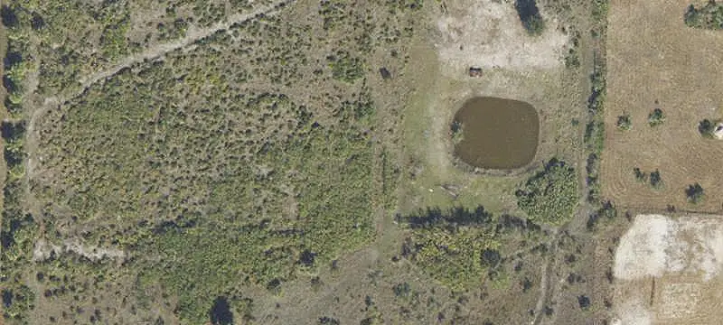 Partially Fenced Residential Acreage Lot