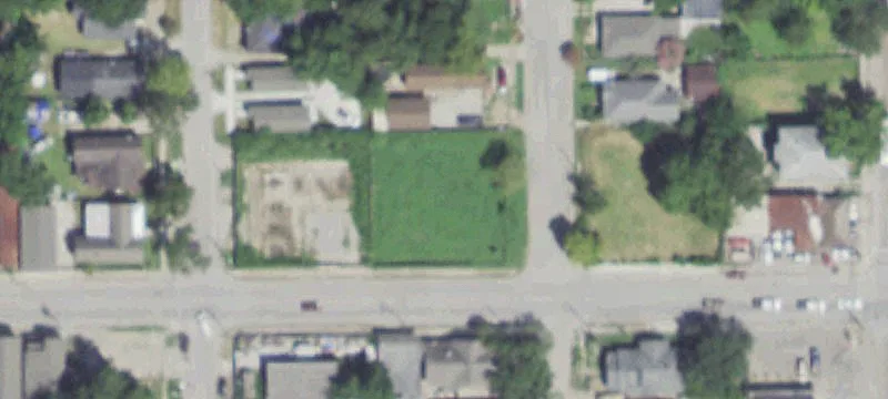 Fenced Paved Corner Lot