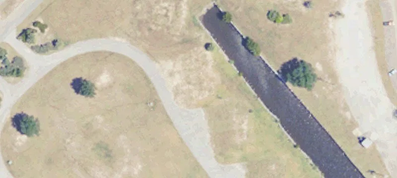 Wooded Waterfront Land Parcel