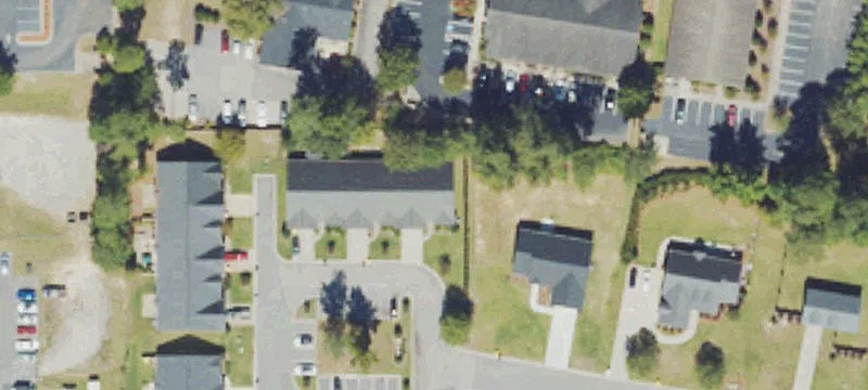 Wooded Commercial Land Parcel