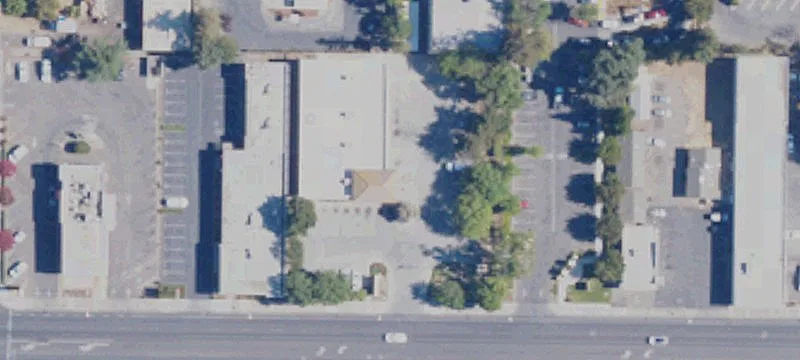 Ground-Leased Automotive Storefront