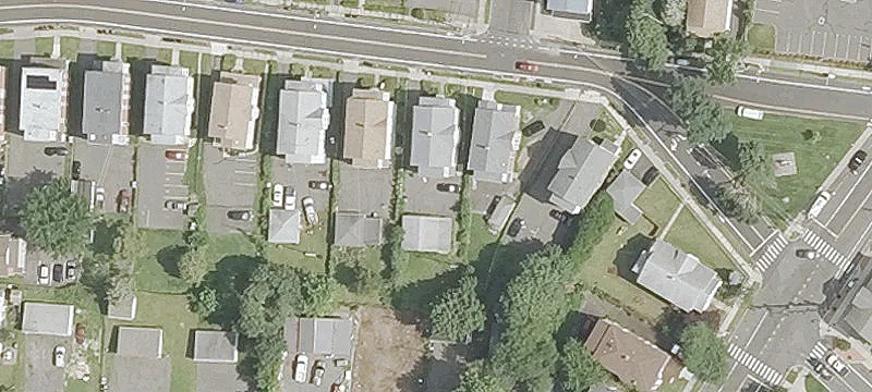 Three-Family Home with Garages